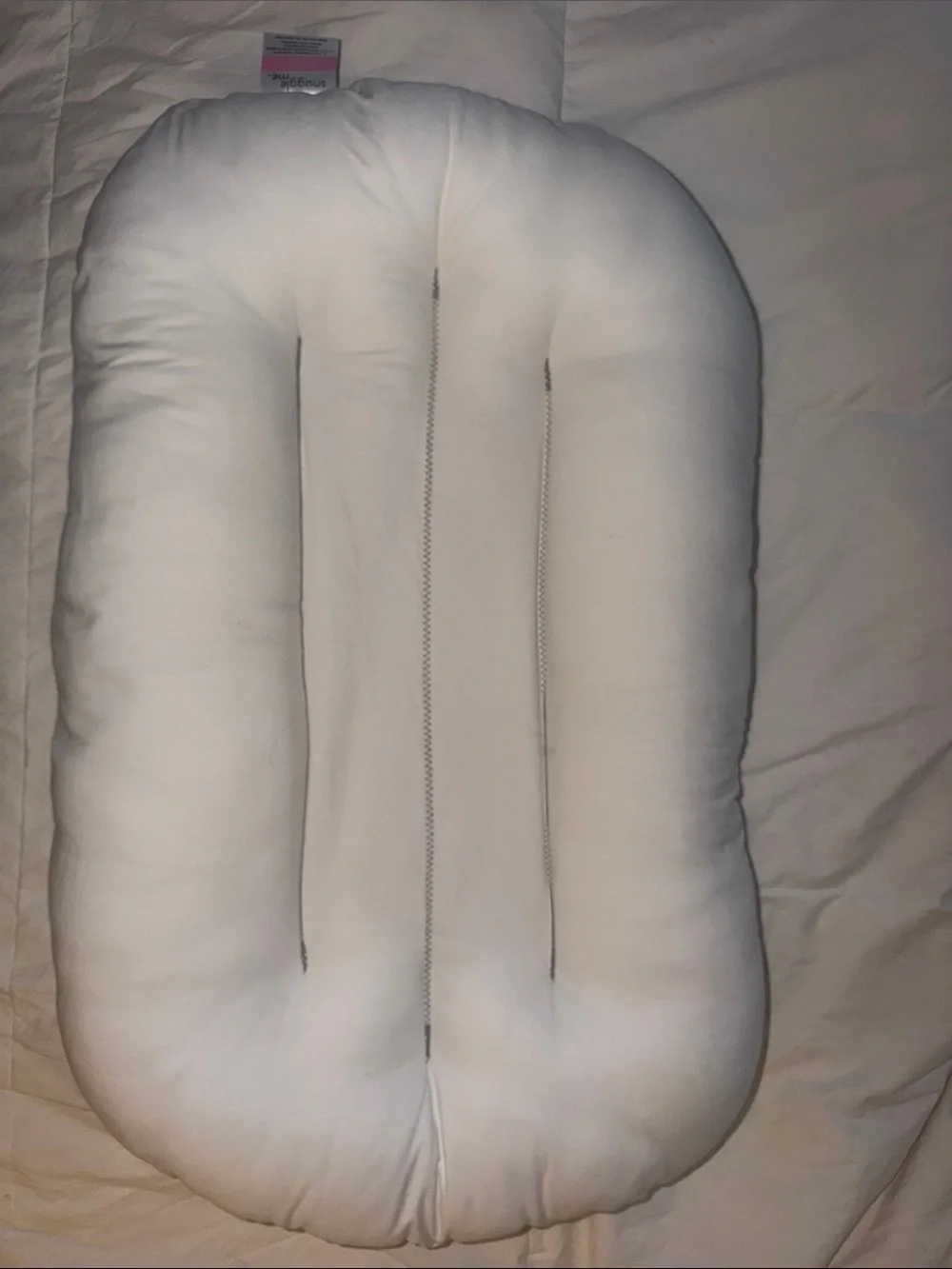 Snuggle Me patented sensory lounger pillow to hug your baby